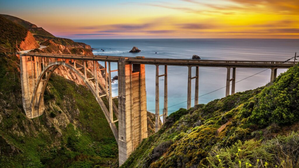 California, Bixby Creek Bridge in Big Sur and Pacific Coast Highway at sunset