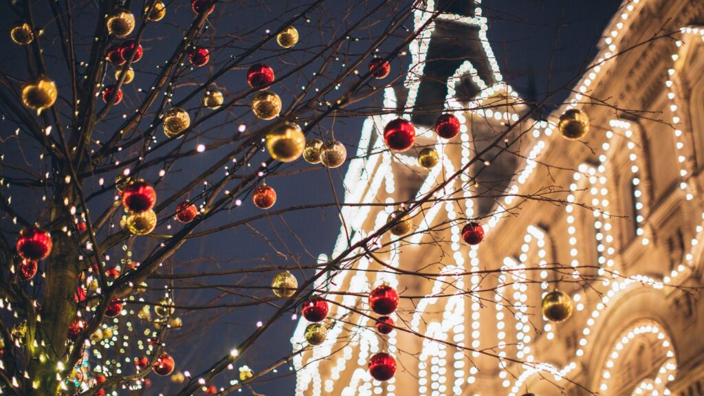 Christmas Lights Baubles on Tree Branches