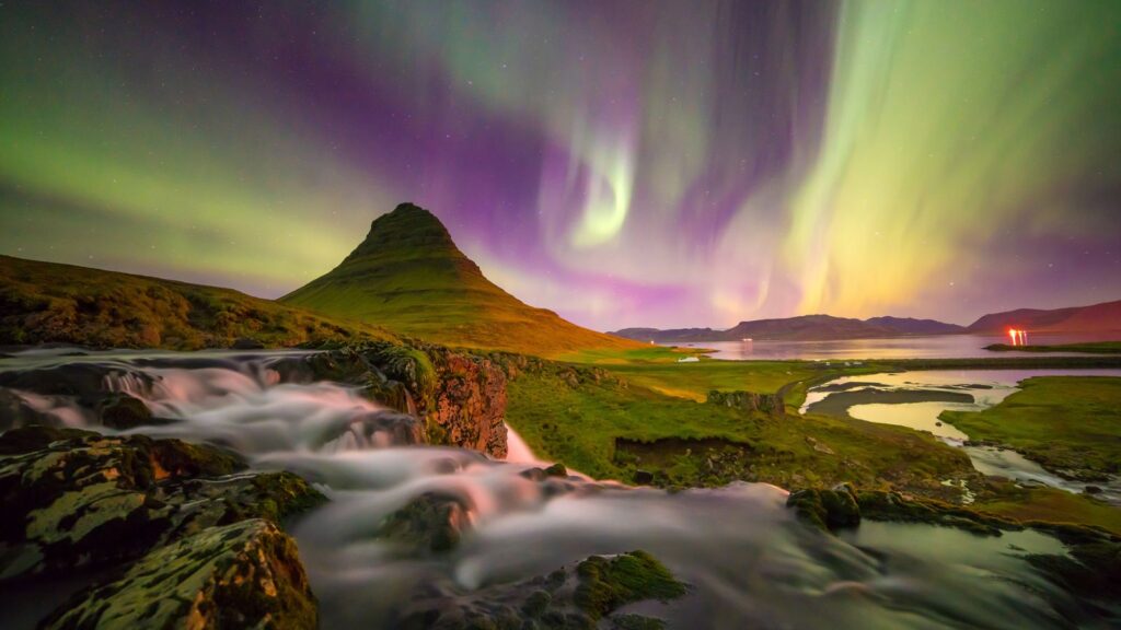 Iceland, Northern light over Kirkjufell mountain