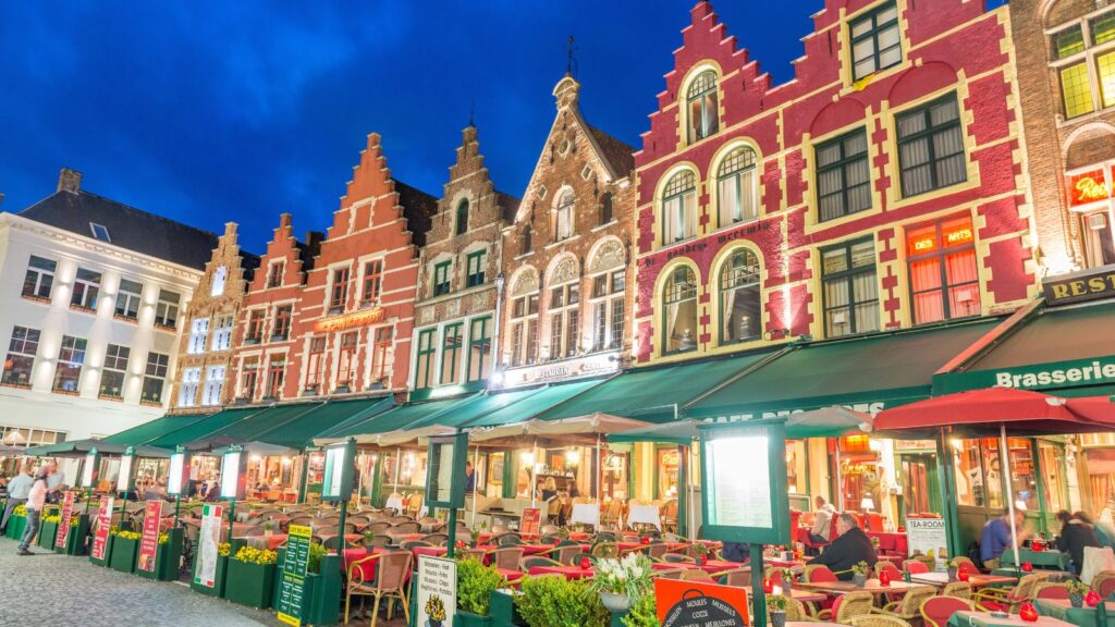 Belgium, Bruges, Night view of decorated market place