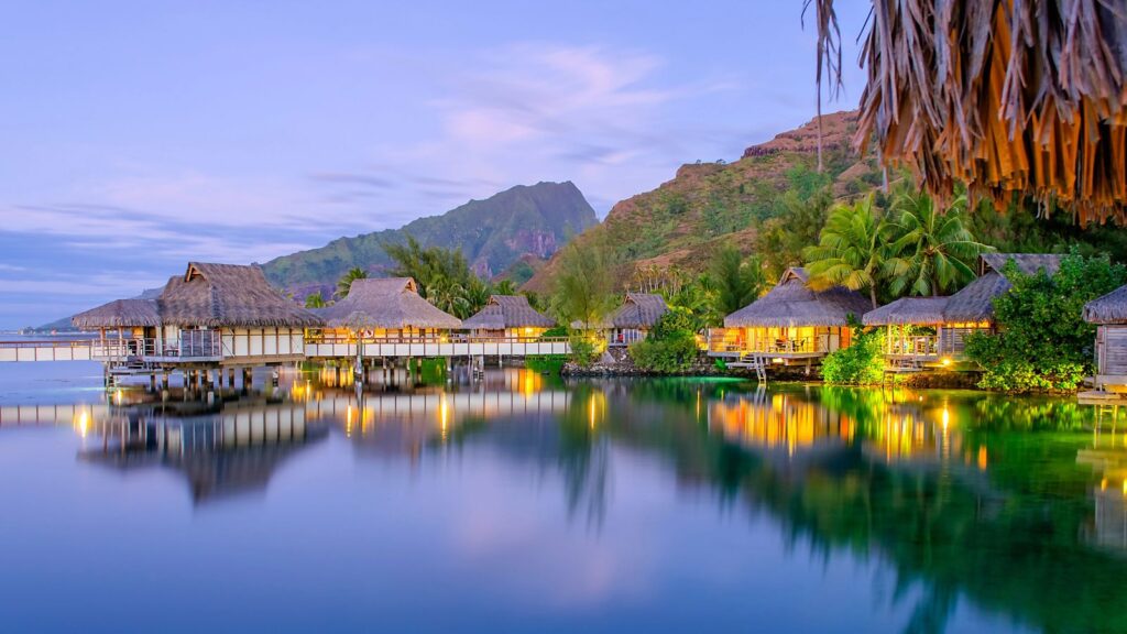 French Polynesia, Overwater Bungalows at dusk