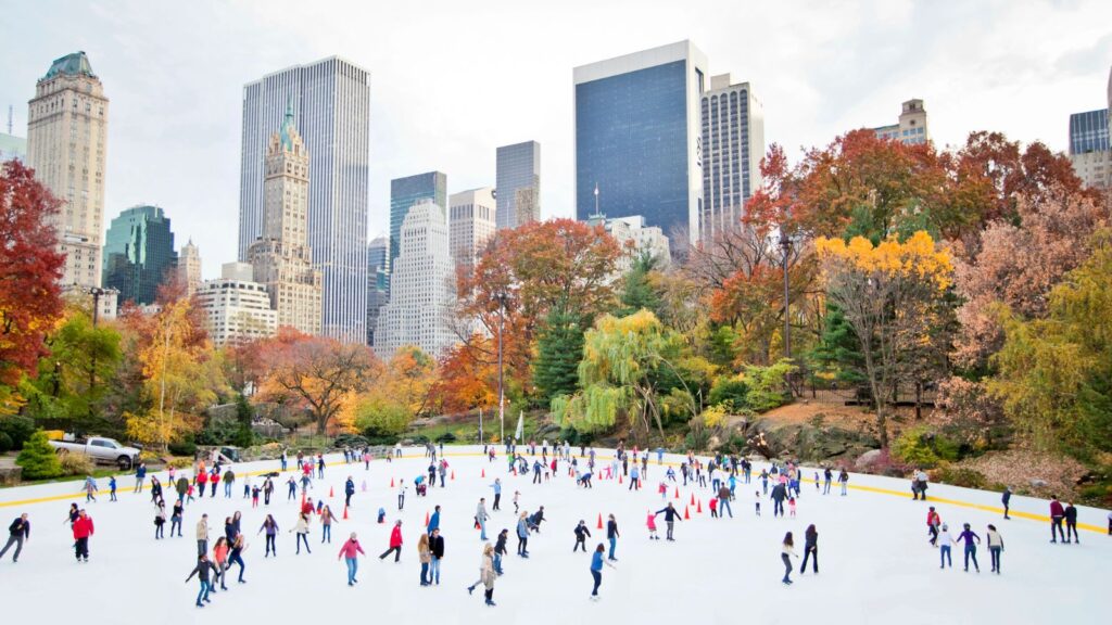 New York, Ice skaters having fun in Central Park during fall