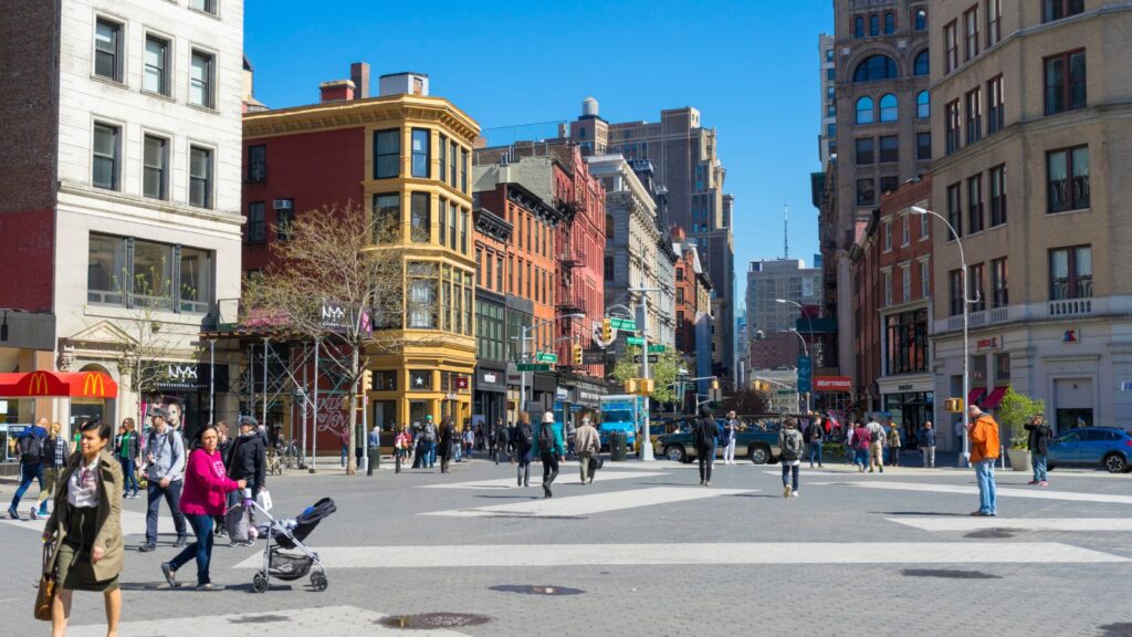 New York, People walking on the street at Union Square Market