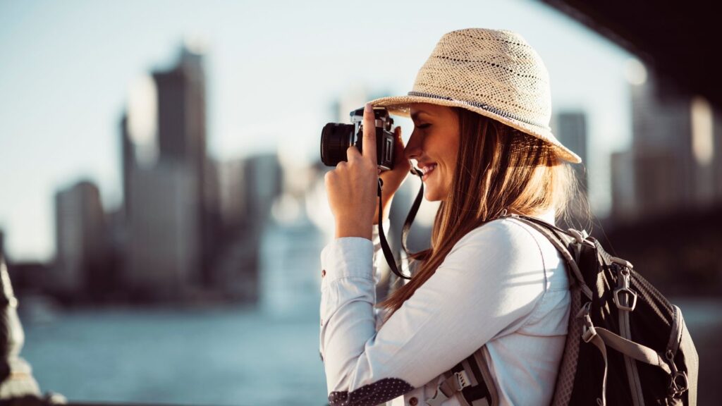 Tourist Woman with Camera