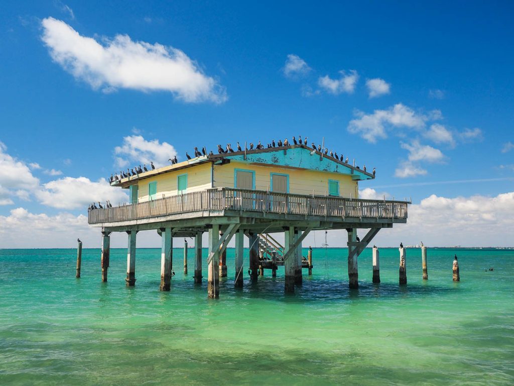 Stiltsville, Biscayne National Park, Florida 03-01-2019 Bay Chateau, one of seven remaining stilt houses over the grass flats of the park.