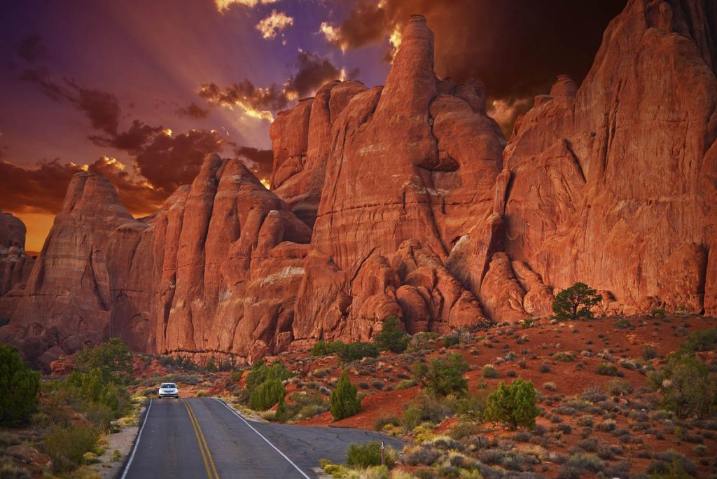 Utah, Moab, Arches National Park scenic road with red rock formations