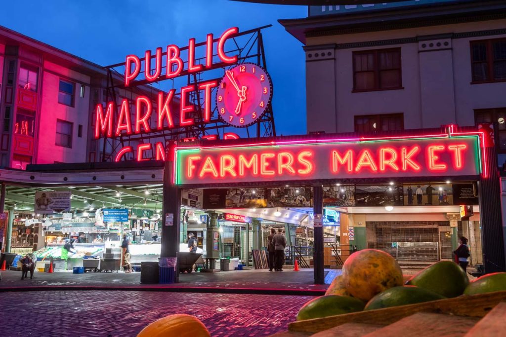 Seattle, United States: Produce in Front of Neon Pikes Place Sign