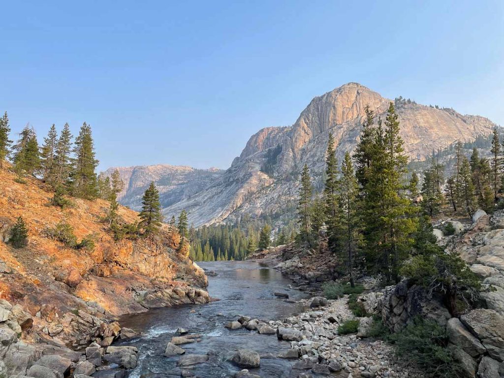 California, A mesmerizing landscape with a river, green trees, and mountains in Yosemite National Park NP