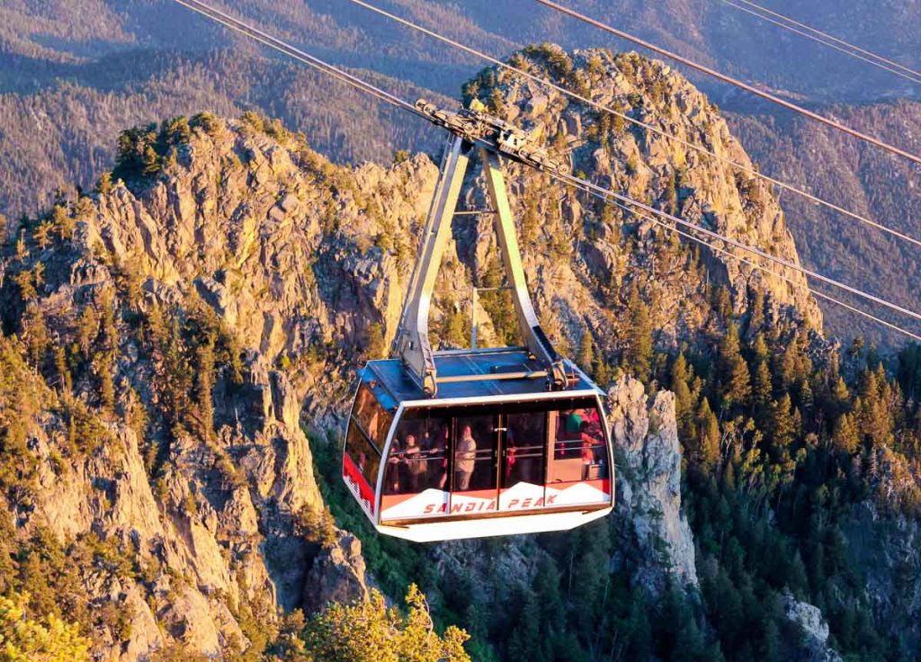ALBUQUERQUE, NEW MEXICO, JUNE 18. The Sandia Peak Aerial Tramway Observation Deck on June 18, 2017, in Albuquerque, New Mexico. A Sandia Peak Aerial Tramway Uphill Tramcar Seen from the Observation Deck in Albuquerque, New Mexico.