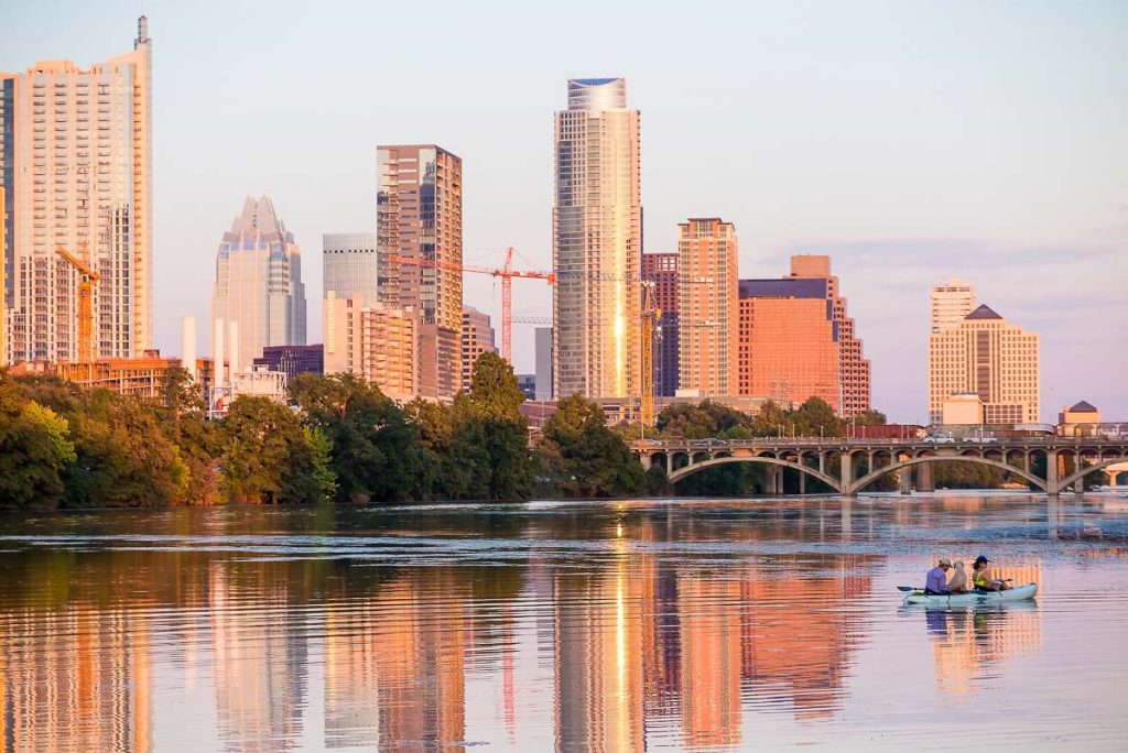 Austin, Texas, USA downtown skyline reflected on Lady Bird Lake at sunset