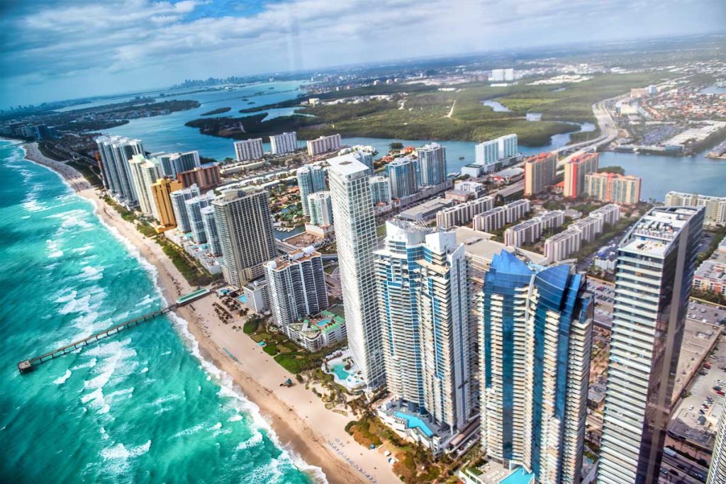 North Miami Beach aerial view of skyscrapers along the shoreline, Florida