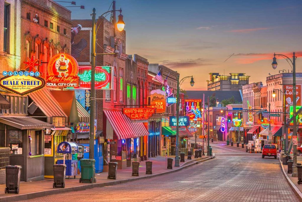 Memphis, Tennessee, blues clubs and neon lights along historic Beale Street at twilight