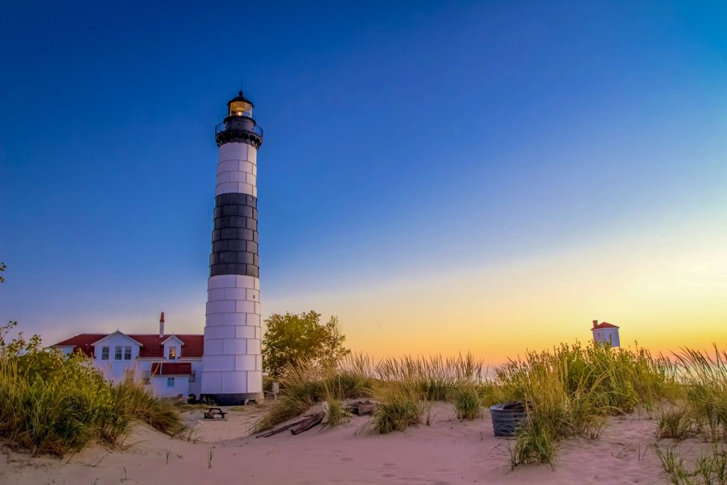 Michigan, Lake Michigan Lighthouse, Big Sable Point amidst the golden hour in Ludington State Park