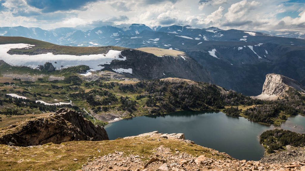 Montana, Absaroka-Beartooth Highway alpine lake surrounded by rugged mountain peaks