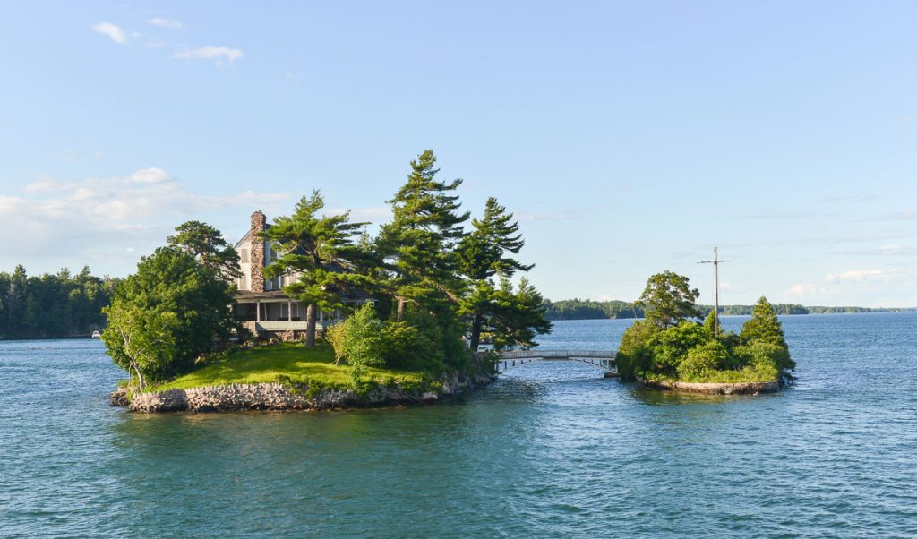 The smallest international bridge connecting two of Thousand Islands on Saint Lawrence River - one island is USA and other is Canada