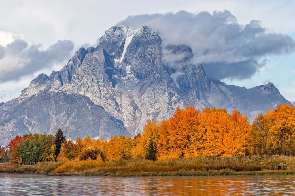 Wyoming, Grand Teton National Park autumn mountains and golden foliage landscape